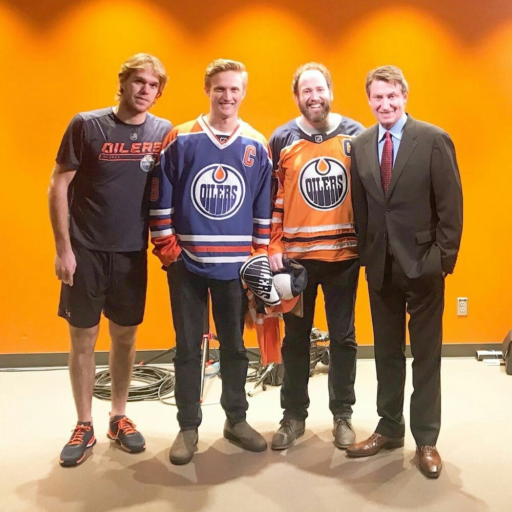 Photo of contest winner Peter Bradshaw with Wayne Gretzky and Connor McDavid.