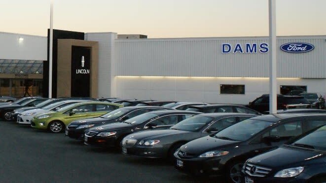 Photo of the outside of the Dams Ford Lincoln dealership