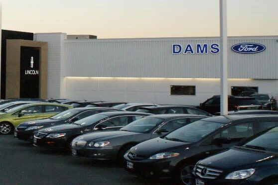 Photo of the outside of the Dams Ford Lincoln dealership