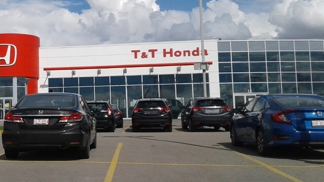 Photo of the outside of the T&T Honda dealership