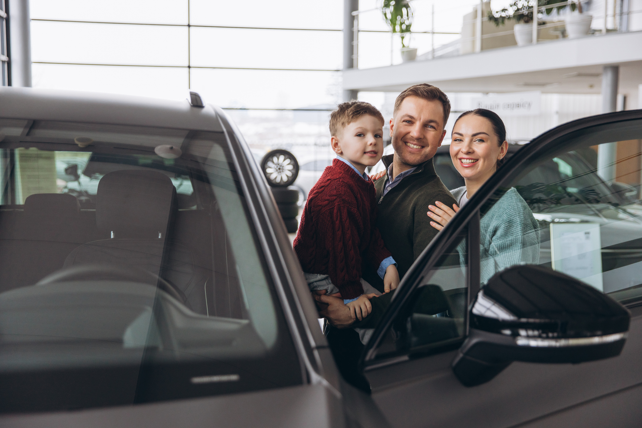 Car family buying happy