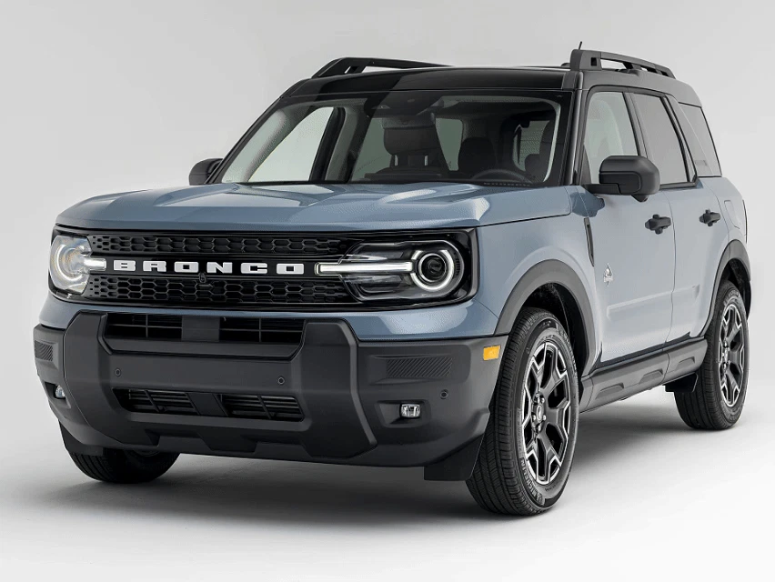 2026 Ford Bronco Outer Banks in blue-gray with roof rack and alloy wheels