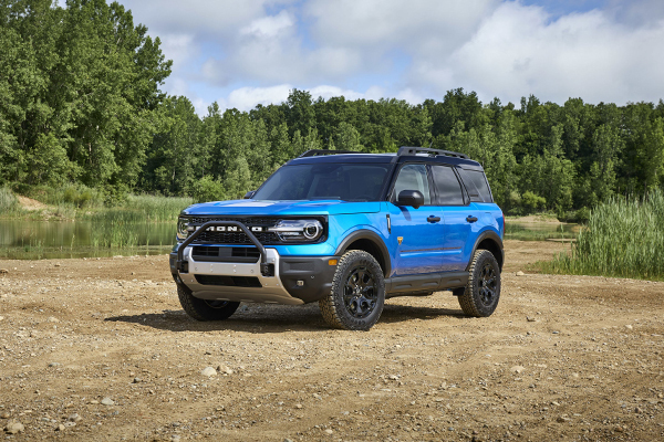 2025 Ford Bronco Sport parked on gravel near water and tree line