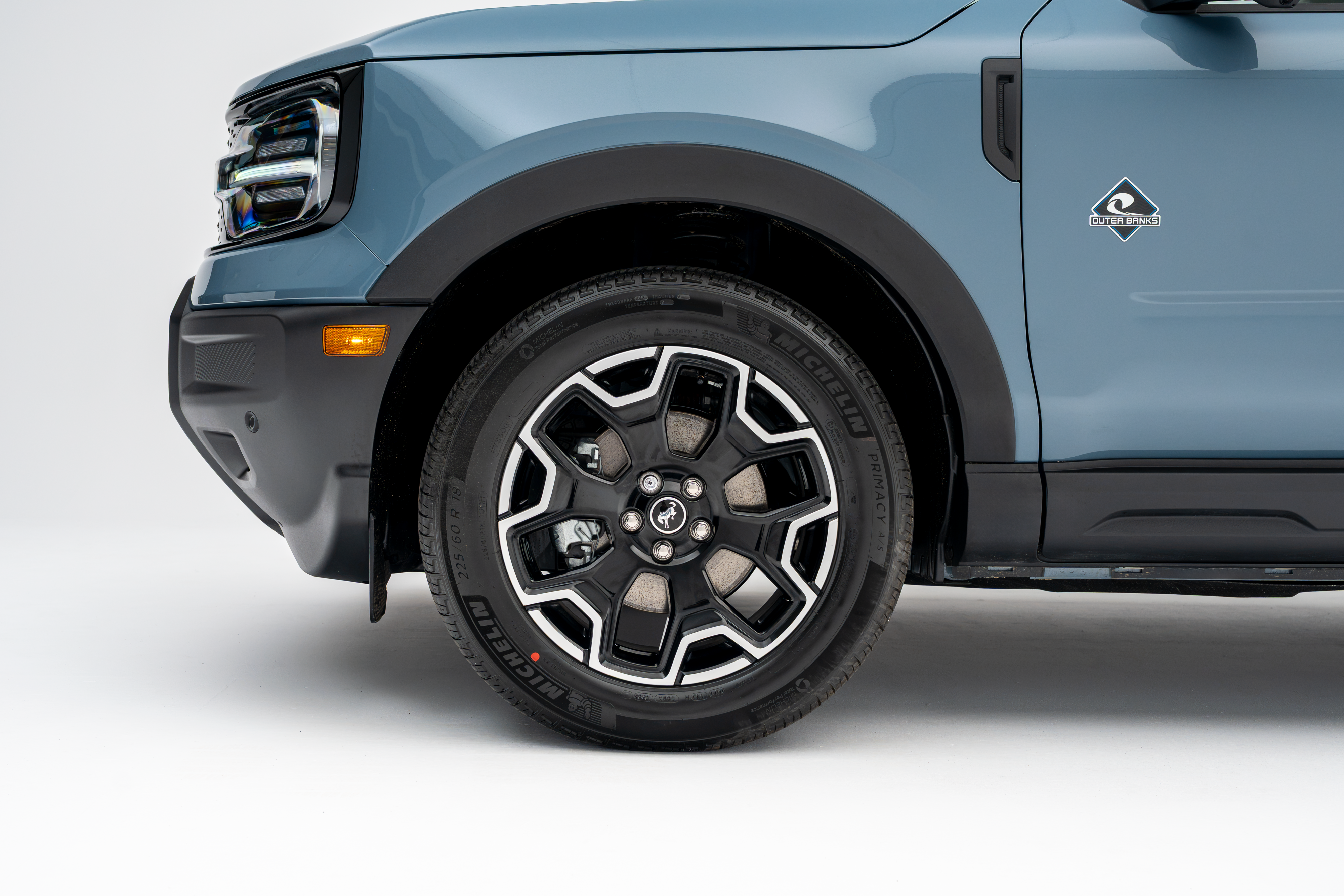 2026 Ford Bronco Sport Outer Banks showing wheel and front quarter panel detail