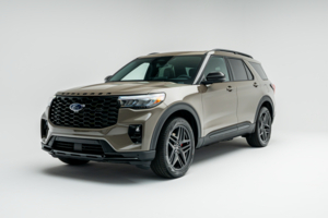 2026 Ford Explorer ST-Line three-quarter front view in tan on white background