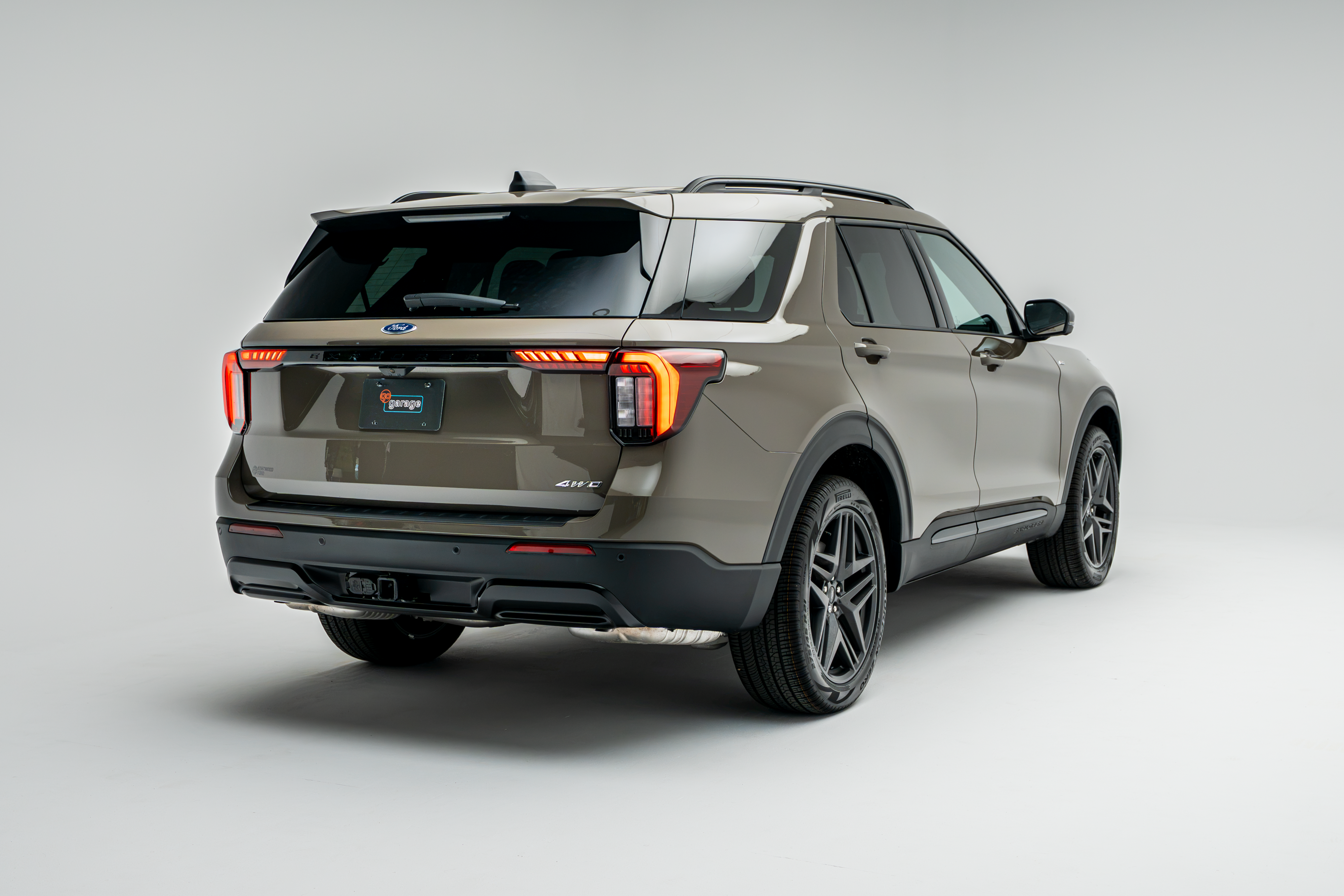 2026 Ford Explorer ST-Line rear three-quarter view showing taillights and alloy wheels