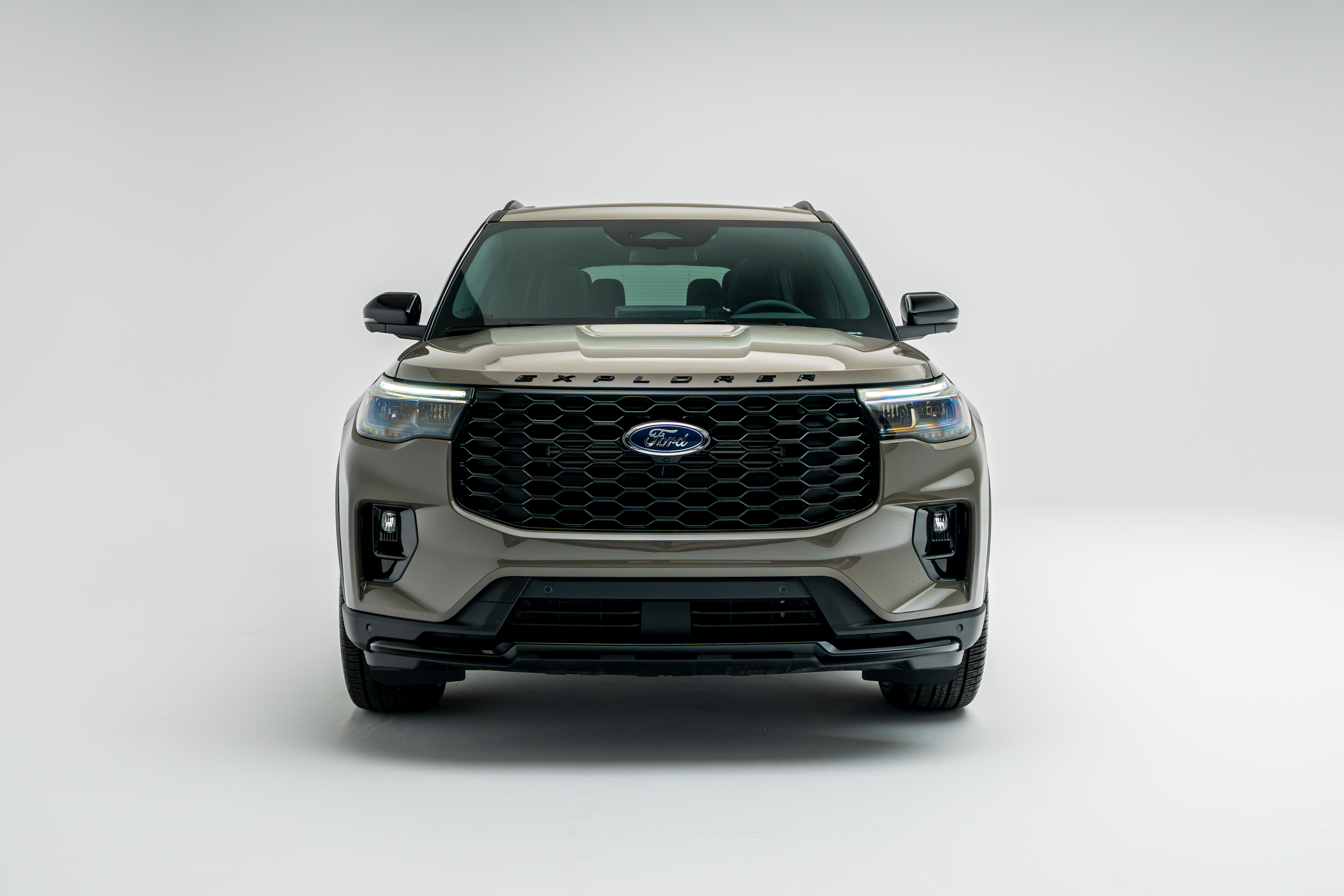 2026 Ford Explorer ST-Line front view with beige exterior and black grille