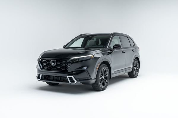 Front three-quarter view of a black 2026 Honda CR-V SUV on a white studio background.