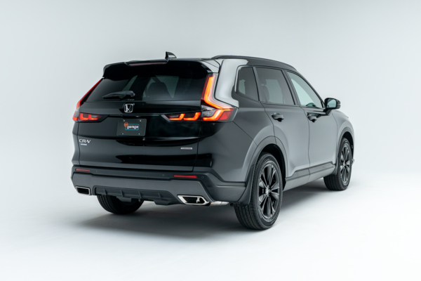 Rear three-quarter view of a black 2026 Honda CR-V showing LED taillights, alloy wheels and SUV profile.