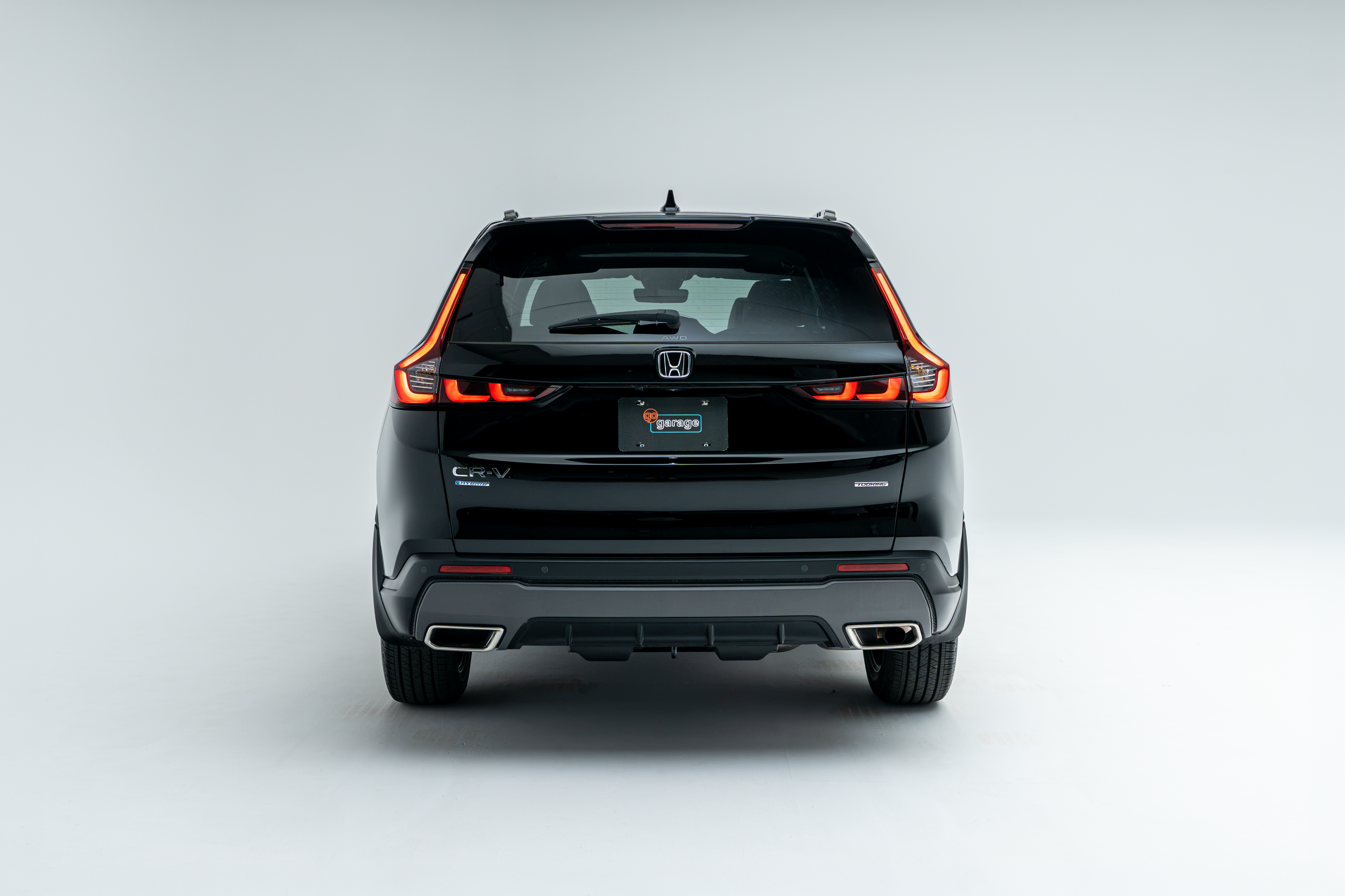 Rear view of a black 2026 Honda CR-V showing LED taillights, rear bumper and AWD badging.