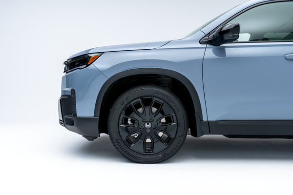 2026 Honda Pilot front quarter panel and wheel detail view