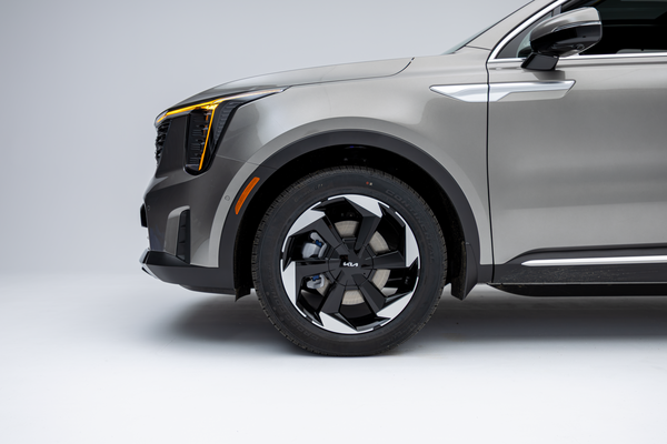 2026 Kia Sorento front quarter view showing LED headlight and alloy wheel detail