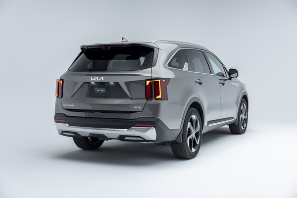 2026 Kia Sorento rear three-quarter view against white background