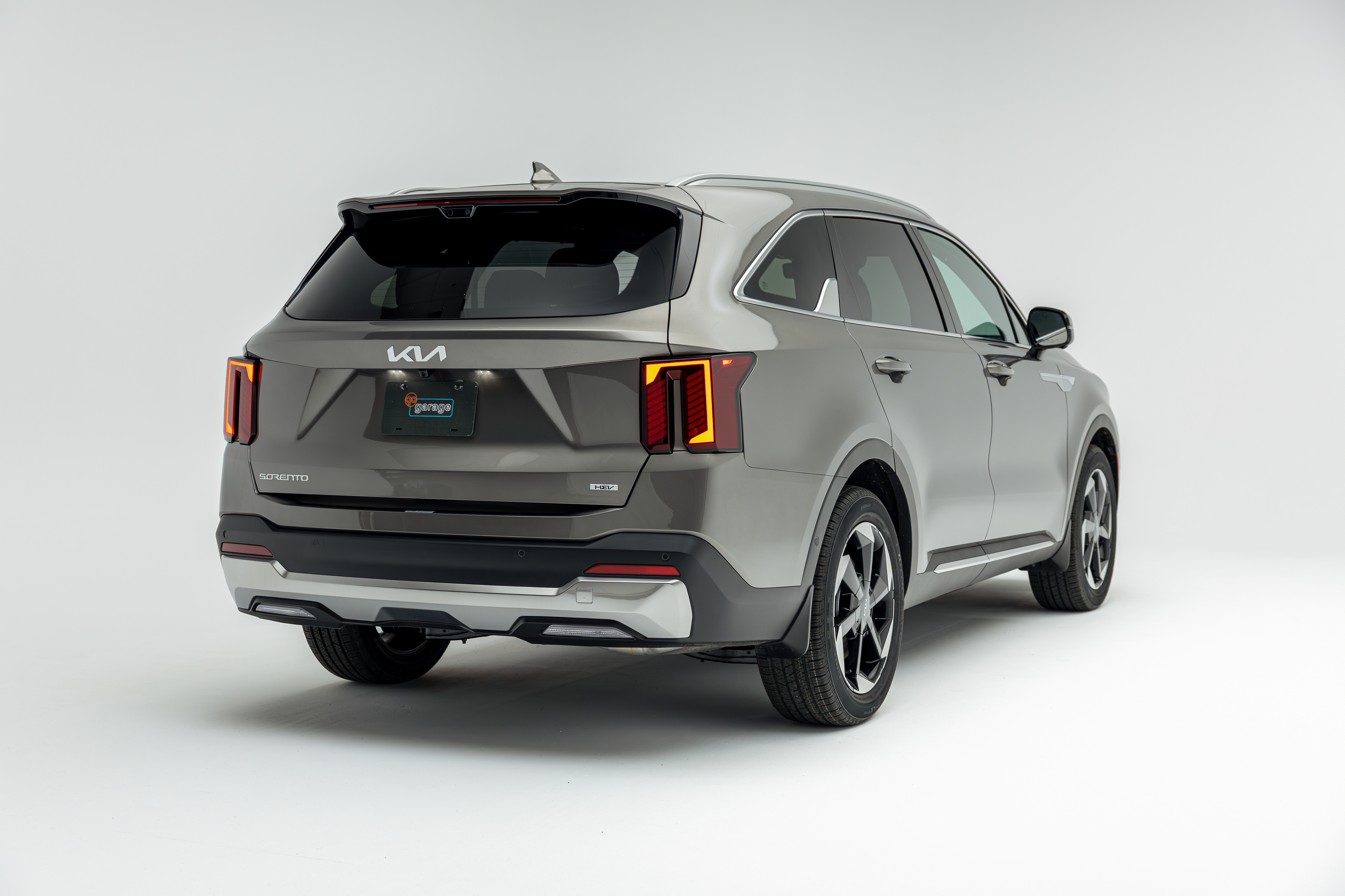 2026 Kia Sorento rear three-quarter view against white background