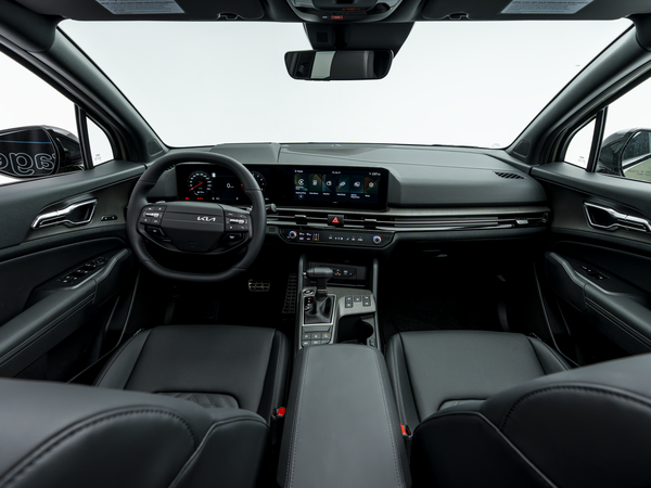 2026 Kia Sportage dashboard and interior with touchscreen display and steering wheel