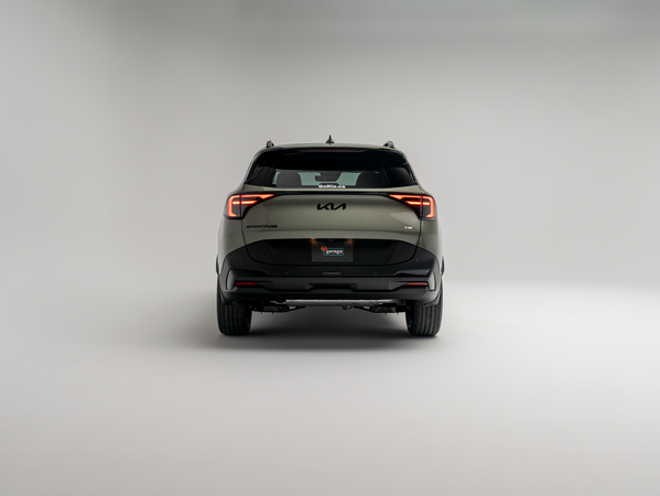 2026 Kia Sportage rear view with illuminated taillights