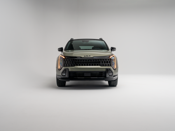 2026 Kia Sportage front view with distinctive grille and LED headlights