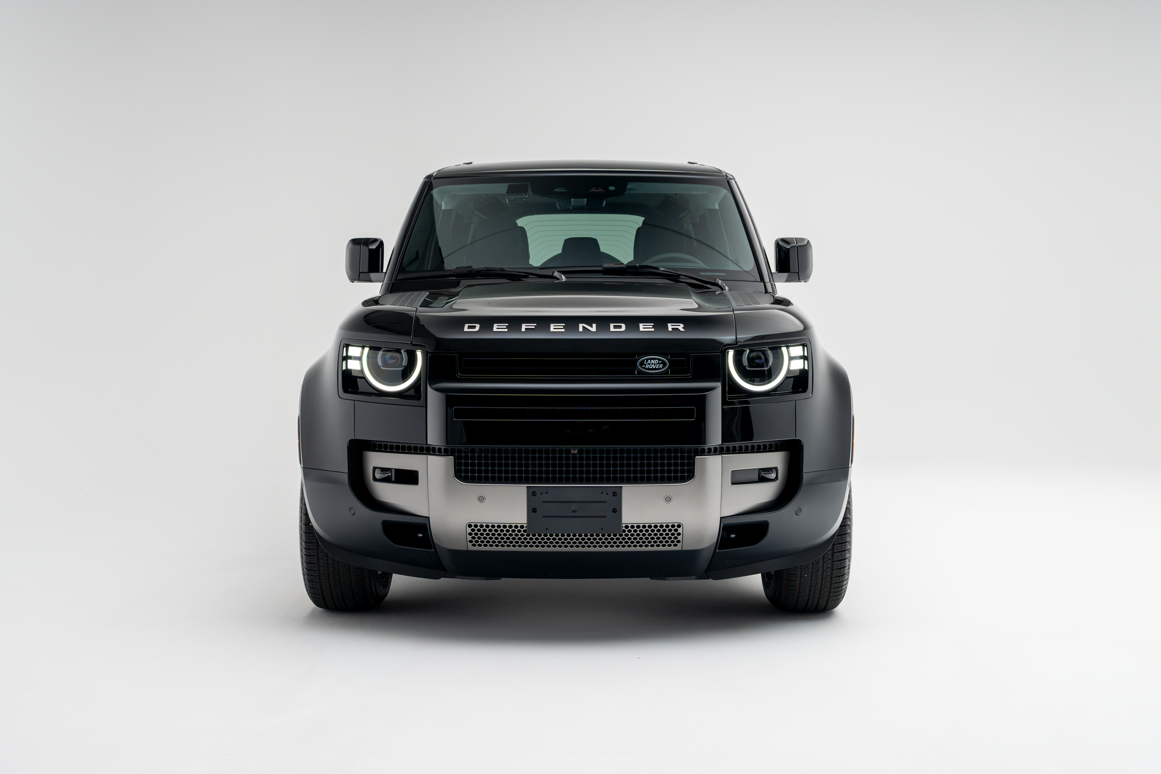 2026 Land Rover Defender 110 S front exterior view with LED headlights