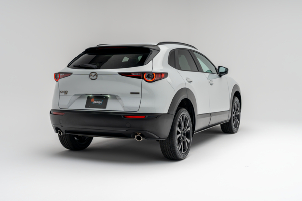 2026 Mazda CX-30 GS in white shown from rear three-quarter view