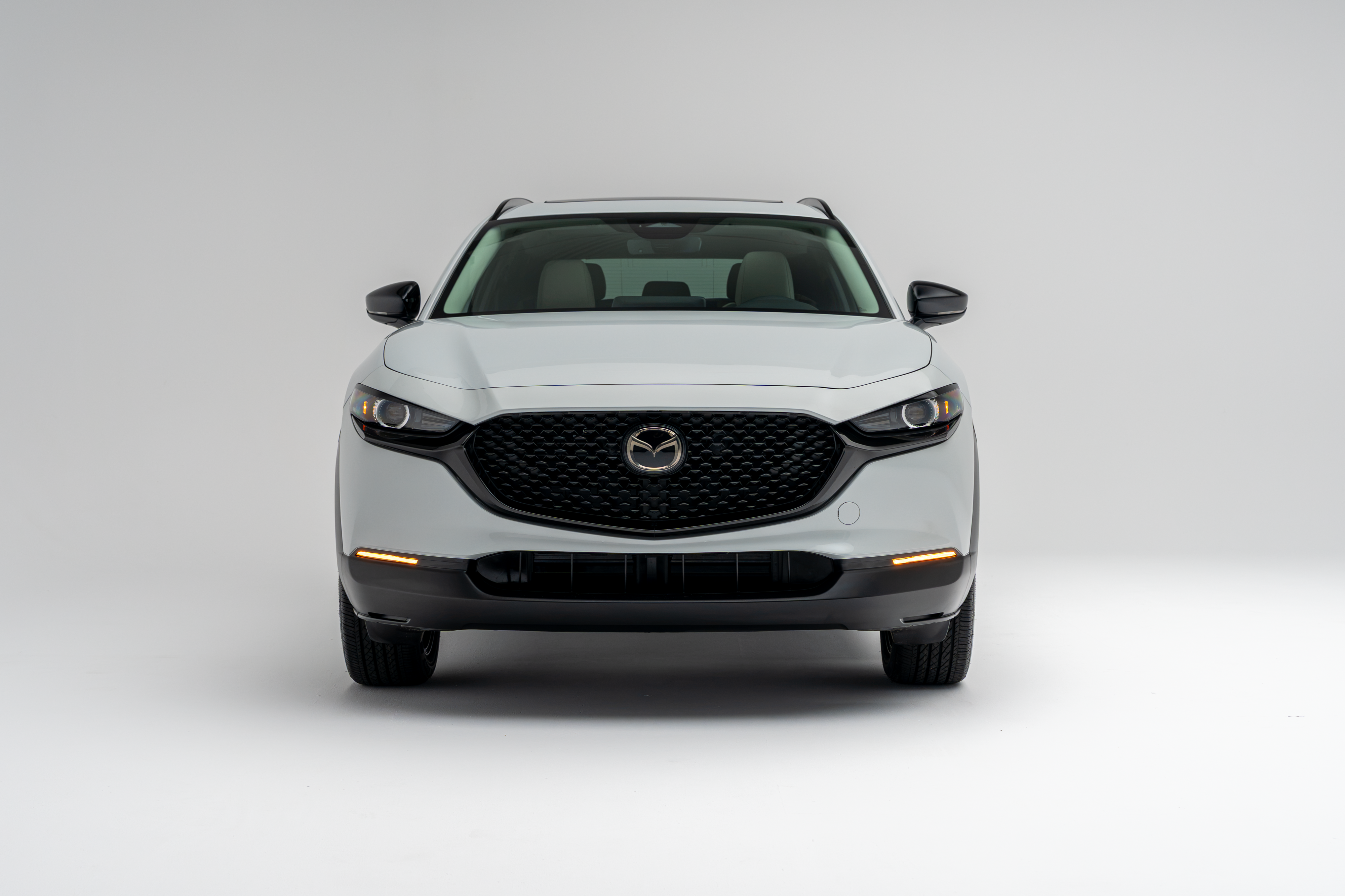 2026 Mazda CX-30 GS front view with white paint and black grille