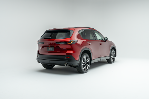 2026 Mazda CX-5 GS shown from rear three-quarter view in red