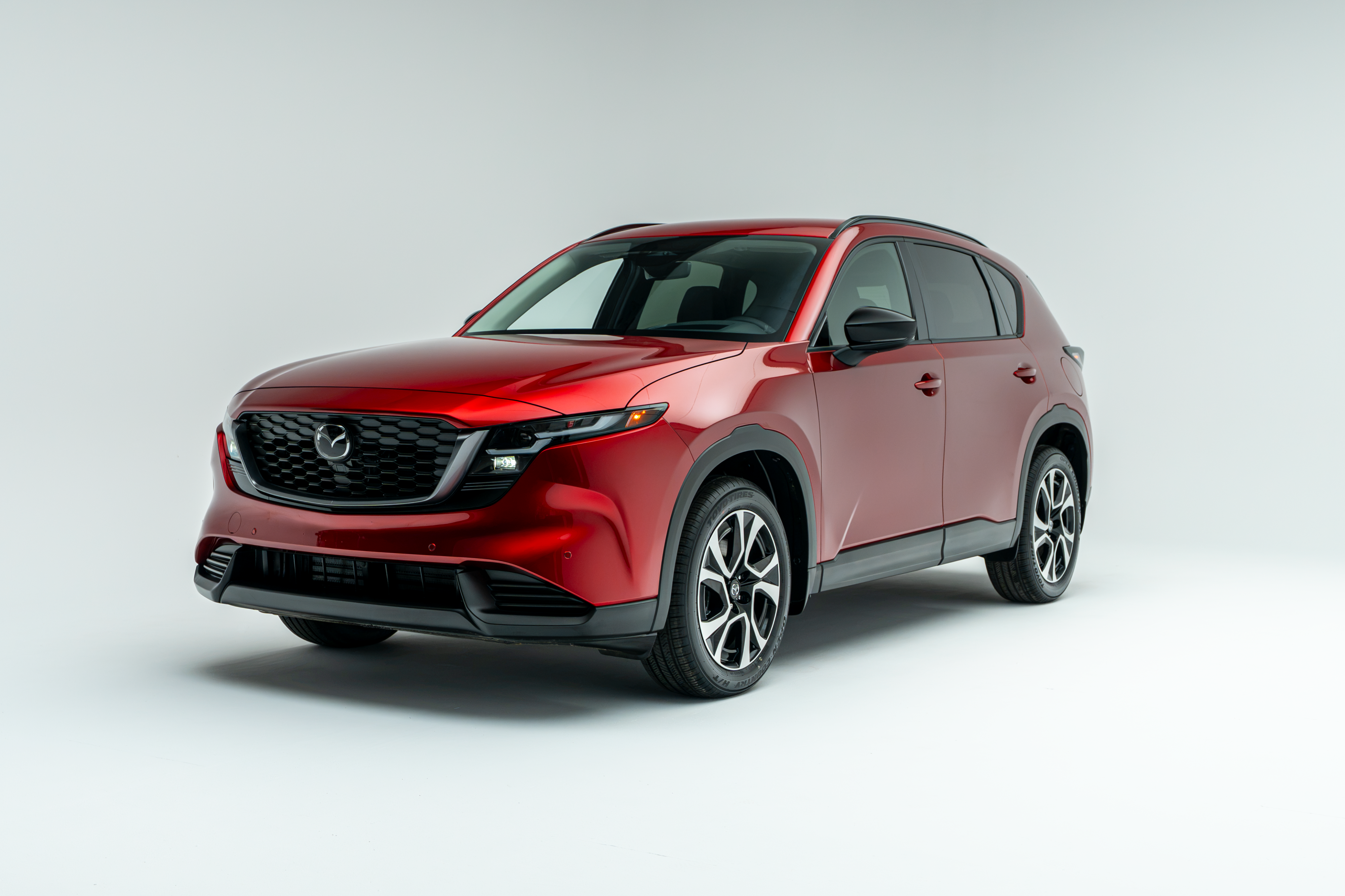 2026 Mazda CX-5 GS in red shown from front three-quarter angle