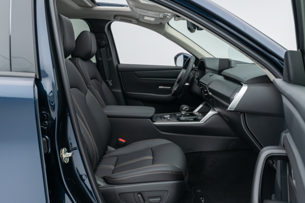 2026 Mazda CX-90 front interior with black seats, dashboard, centre console and sunroof.