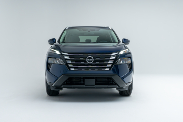 Front view of a blue Nissan Rogue SV Moonroof showing the grille, headlights and front fascia.