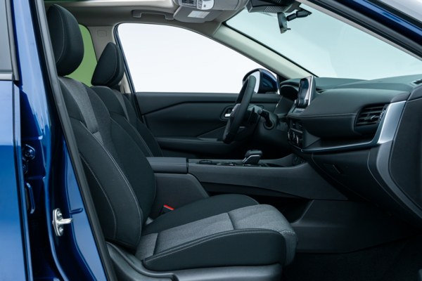 Nissan Rogue SV Moonroof front interior with black seats, dashboard, centre console and moonroof.