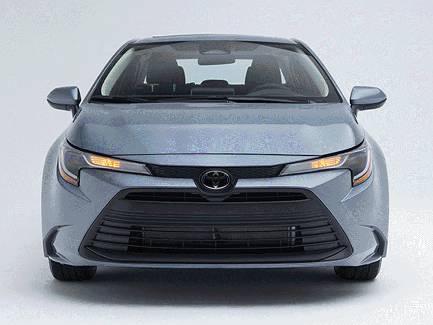GIF showcasing multiple exterior views and features of a light blue Toyota Corolla, including front, side and rear angles on a white studio background.