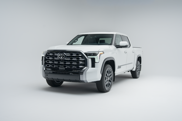 Front three-quarter view of a 2026 Toyota Tundra showing LED headlights, grille, alloy wheels and pickup truck profile.