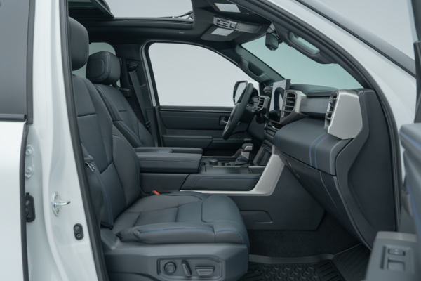 2026 Toyota Tundra front interior with seats, dashboard, centre console and infotainment display.