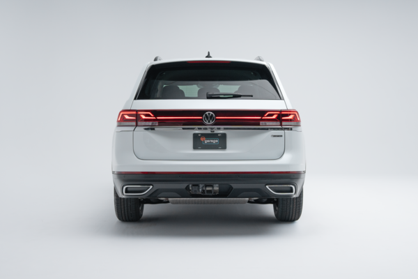 Rear view of a white 2026 Volkswagen Atlas Comfortline showing LED taillights, rear bumper and SUV design.
