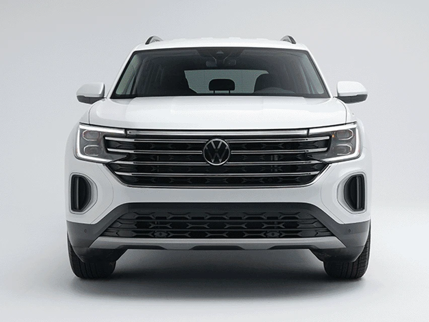 GIF featuring a white Volkswagen Atlas from multiple angles, highlighting its exterior design, wheels and rear styling.