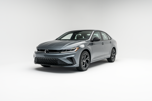 2026 Volkswagen Jetta in gray, shown from a front three-quarter view on a white background.