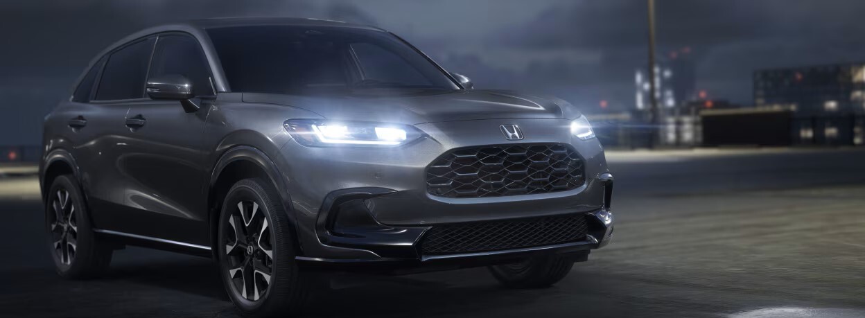2026 Honda HR-V at night with LED headlights on.