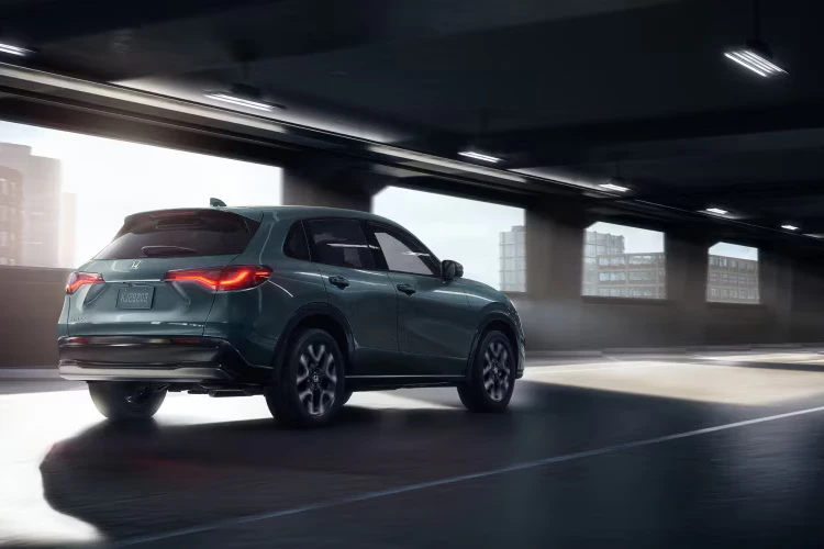 2026 Honda HR-V driving through a covered bridge.