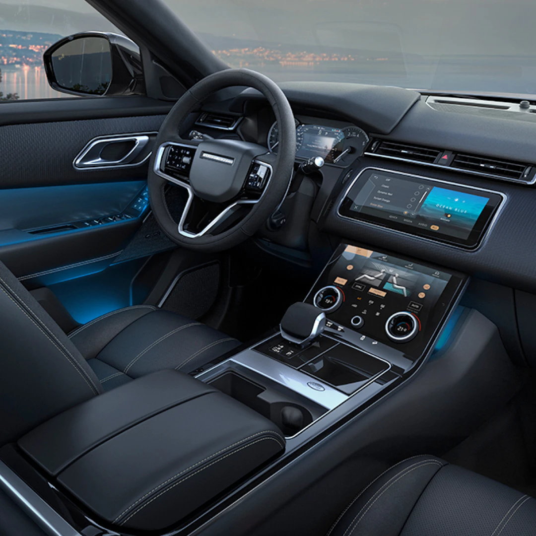 Land Rover Range Rover interior with touchscreen display and steering wheel