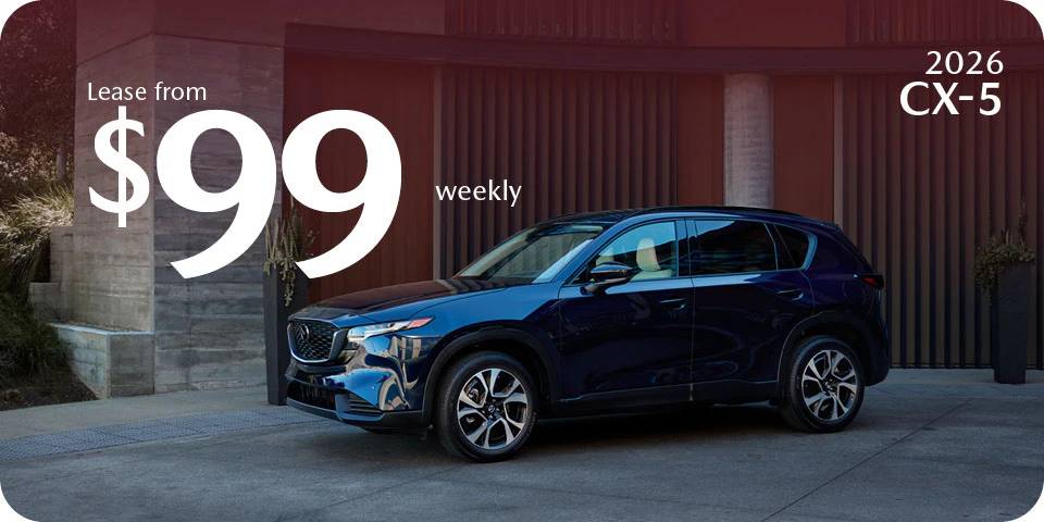 Dark blue 2026 CX-5 from $99 Weekly in Edmonton, AB
