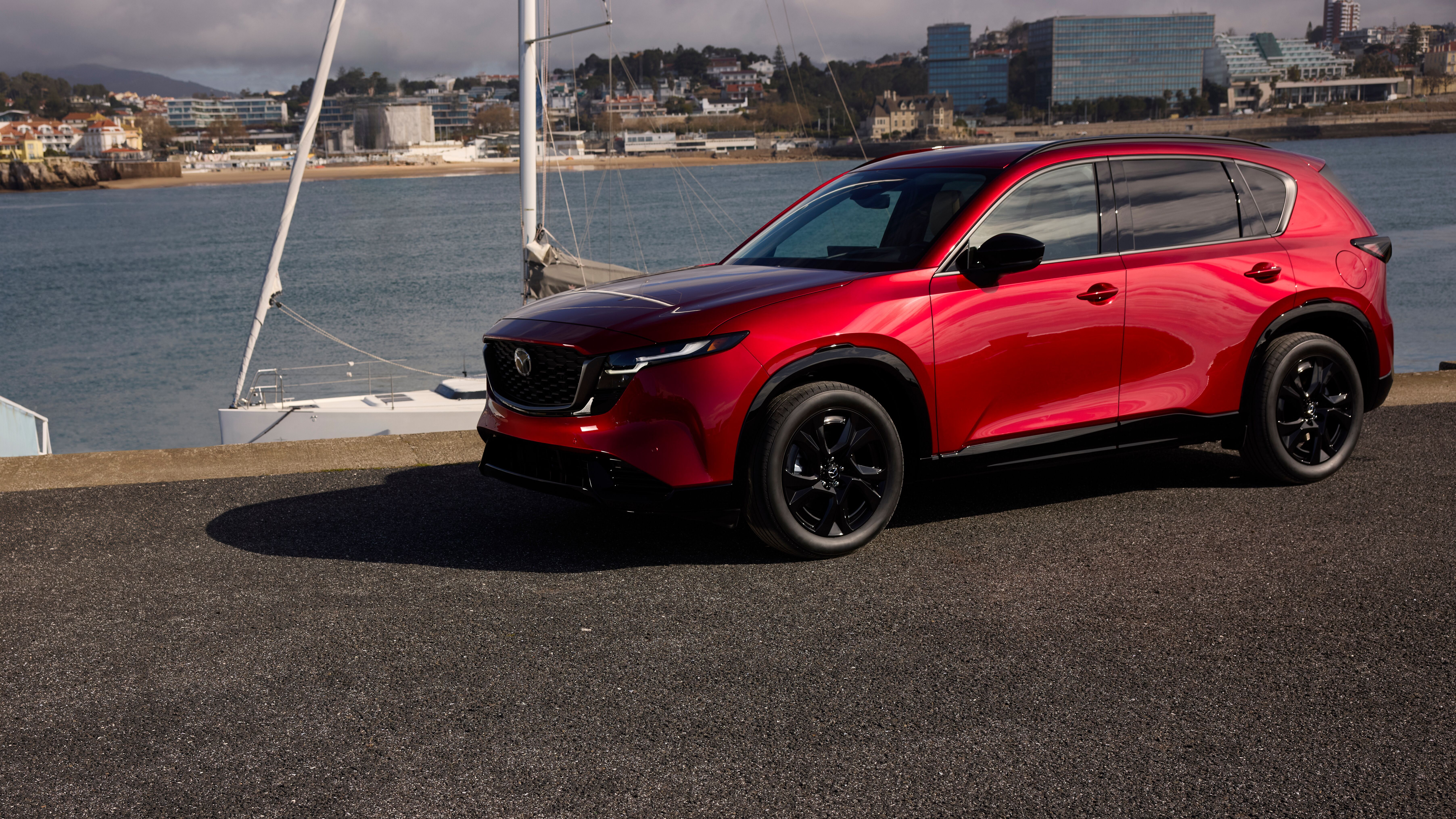 Side of a red 2026 Mazda CX-5.