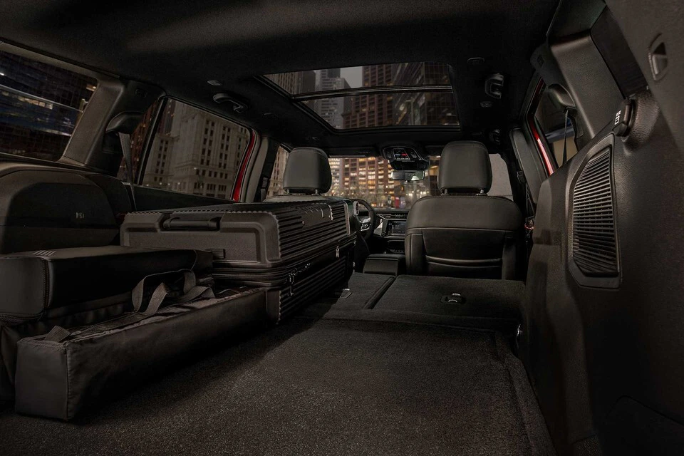 2026 Jeep Cherokee spacious interior with cargo area and city skyline visible through panoramic windows
