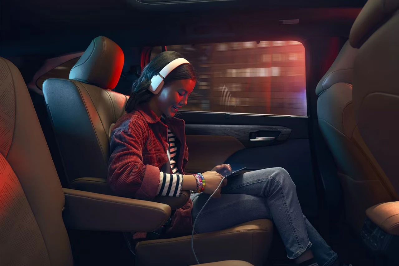Toyota 2026 Highlander Hybrid interior child playing games