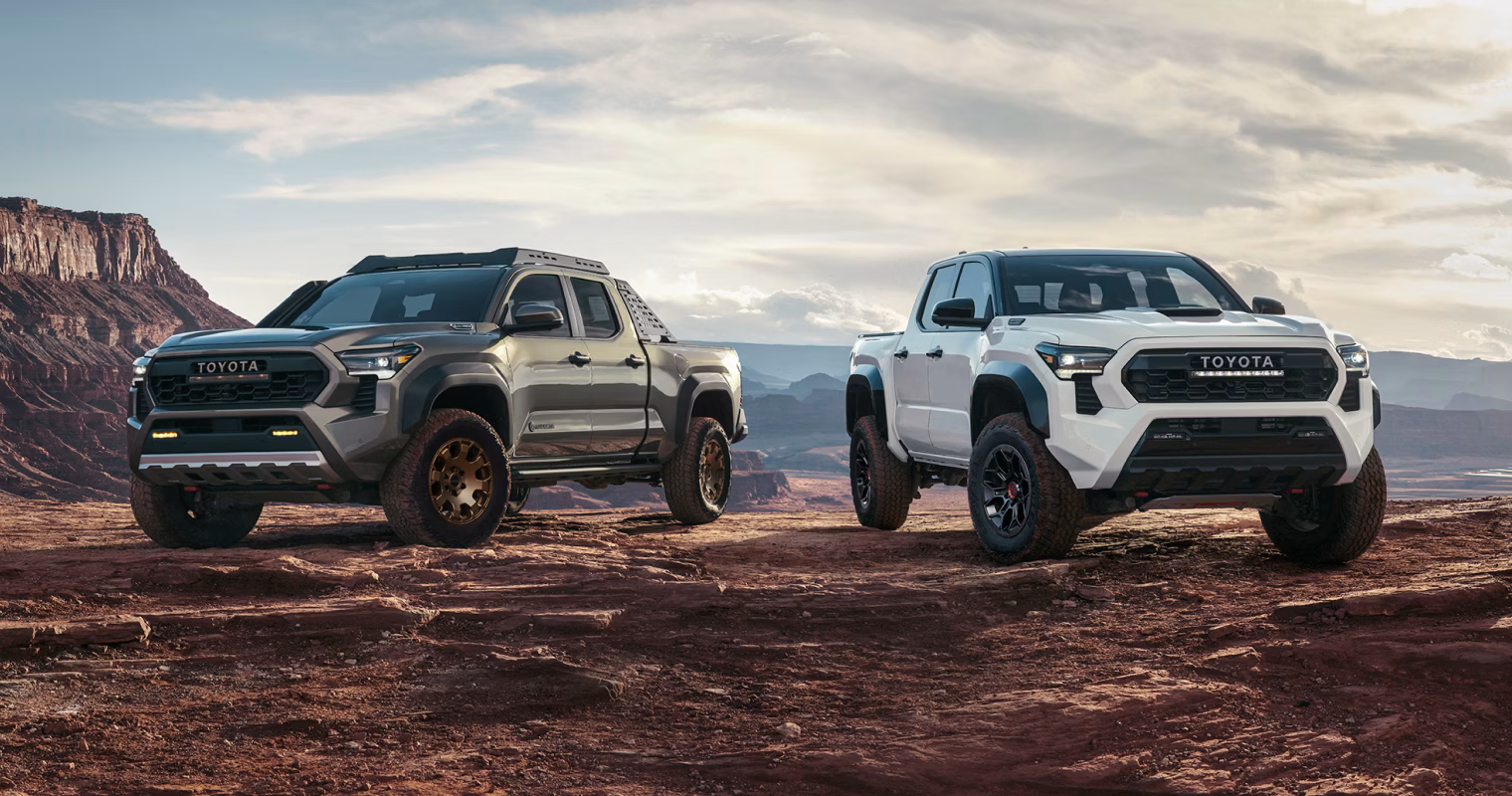 Toyota - Two (2) 2026 Tacoma trucks in the mountains Trailhunter Bronze Oxide TRD Pro White