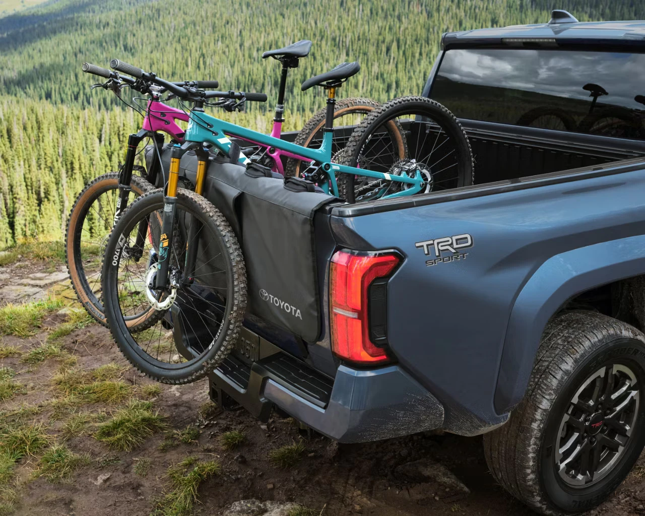 2026 Toyota Tacoma TRD Sport Heritage Blue Rear with bikes