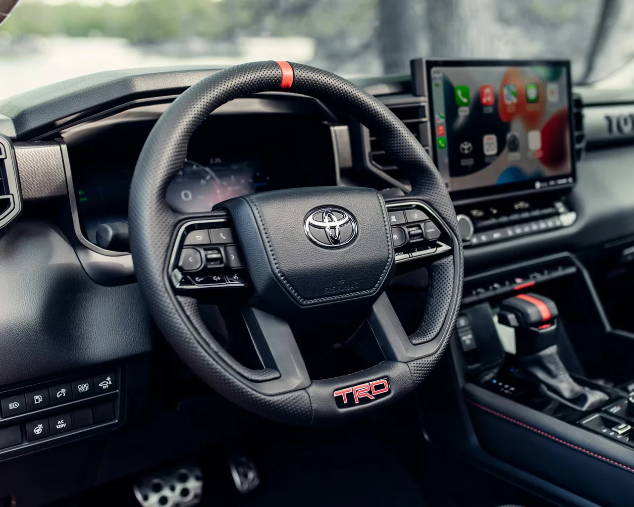 2026 Toyota Tundra Hybrid TRD Pro interior with black Softex steering wheel and touchscreen display