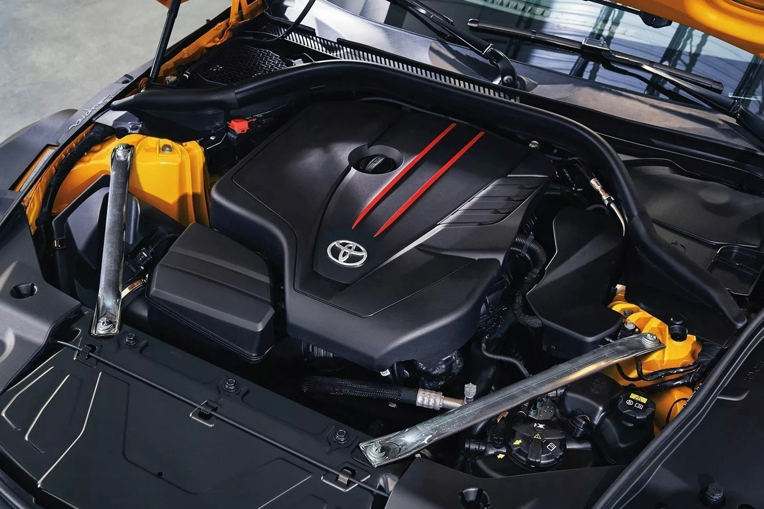 Toyota hood up exposing its engine