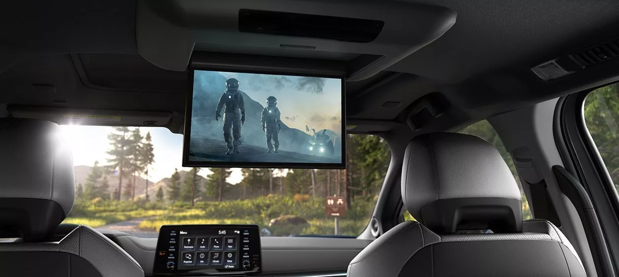Image of a movie playing on a TV inside the Toyota Sienna