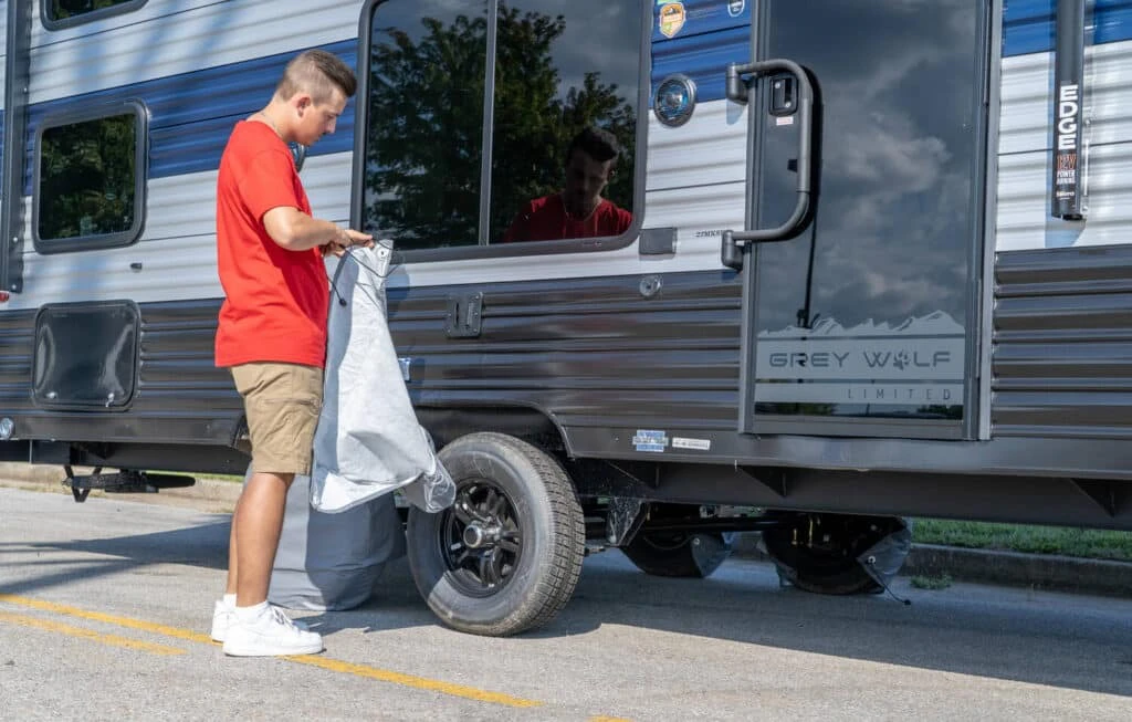 RV covers are put on RV for protection